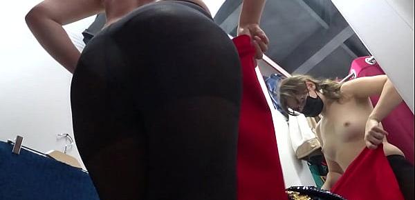  Voyeur peeks under her skirt in public. And with a hidden camera in a fitting room spies on a girl with a juicy ass in nylon tights. Foot fetish.